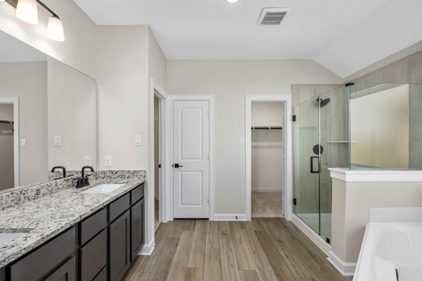 Bathroom, Dual Sink Vanities, Glass Shower, Interior, Recessed Lighting, Wood Texture Flooring