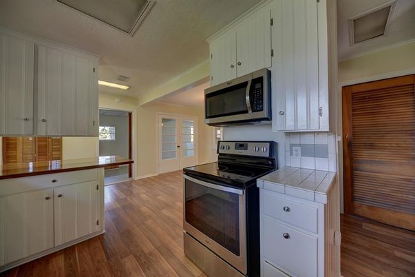 Interior, Kitchen, Tile Countertops, Wood Texture Flooring