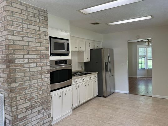 Interior, Kitchen, Stainless Steel Appliances, Stone Walls