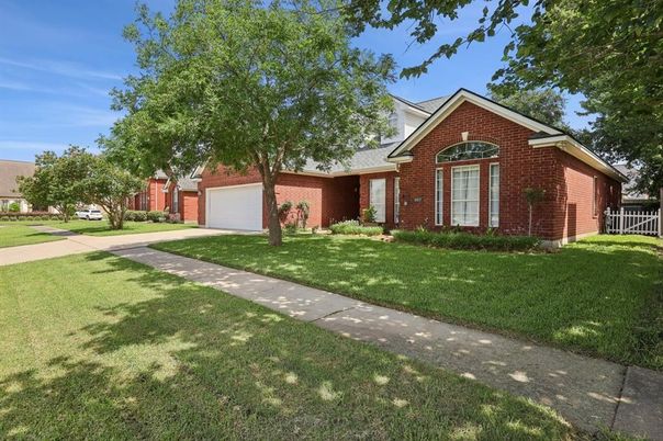 Attached, Backyard, Exterior, Facade, Brick Facade, Brick Traditional