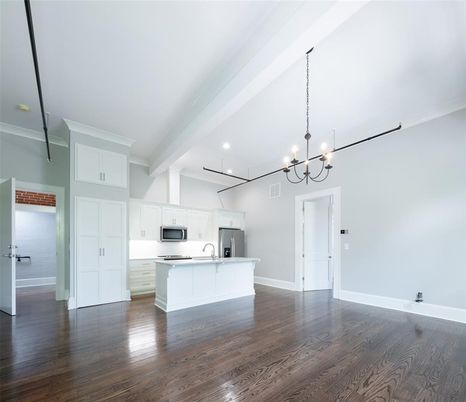 Chandelier, Empty room, Interior, Kitchen, Recessed Lighting, Stainless Steel Appliances, Wood Texture Flooring
