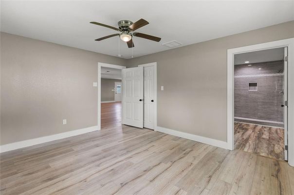 Bathroom, Empty room, Glass Shower, Interior, Recessed Lighting, Wood Texture Flooring