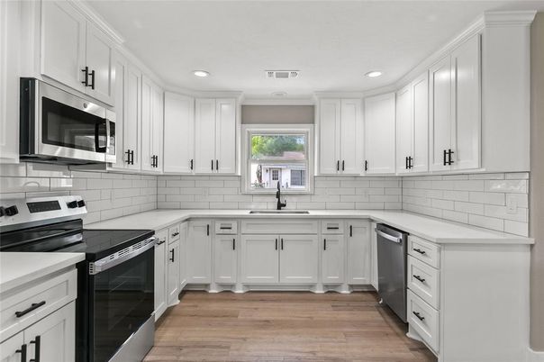 Interior, Kitchen, Recessed Lighting, Stainless Steel Appliances, Wood Texture Flooring