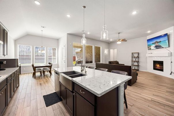 Dining room, Fireplace, Interior, Kitchen, Pendant Lights, Recessed Lighting, Wood Texture Flooring