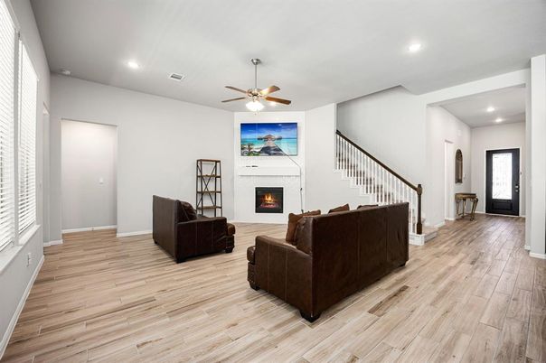 Fireplace, Interior, Living room, Recessed Lighting, Wood Texture Flooring