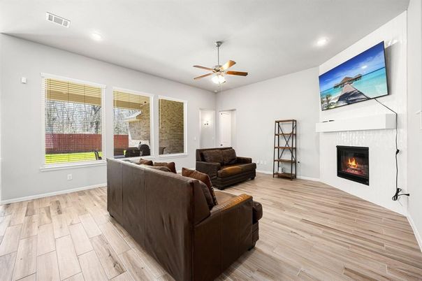 Fireplace, Interior, Living room, Recessed Lighting, Wood Texture Flooring