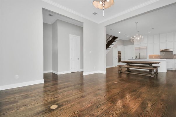 Chandelier, Empty room, Interior, Kitchen, Recessed Lighting, Stainless Steel Appliances, Wood Texture Flooring