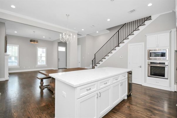 Chandelier, Interior, Kitchen, Pendant Lights, Recessed Lighting, Stainless Steel Appliances, Wood Texture Flooring