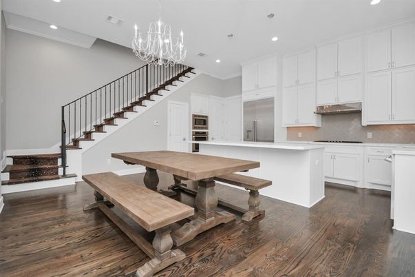Chandelier, Dining room, Interior, Kitchen, Recessed Lighting, Stainless Steel Appliances, Wood Texture Flooring