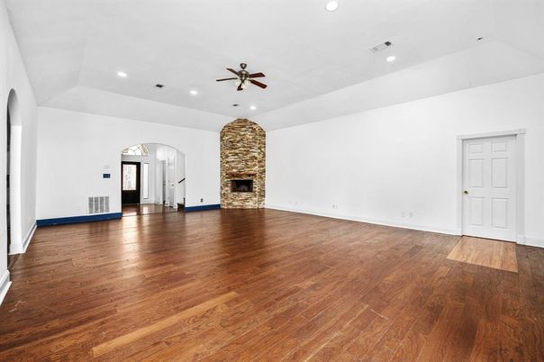 Empty room, Fireplace, Interior, Recessed Lighting, Wood Texture Flooring