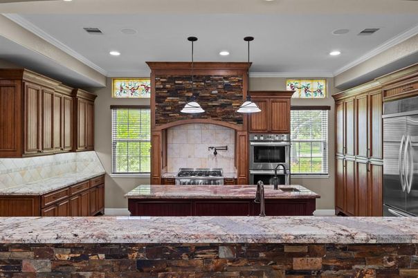 Interior, Kitchen, Pendant Lights, Recessed Lighting, Stainless Steel Appliances, Stone Walls