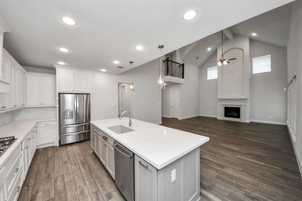 Fireplace, Interior, Kitchen, Pendant Lights, Recessed Lighting, Stainless Steel Appliances, Wood Texture Flooring
