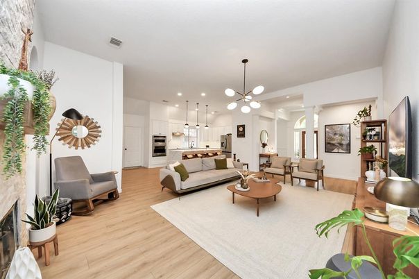 Fireplace, Interior, Kitchen, Living room, Pendant Lights, Recessed Lighting, Stainless Steel Appliances, Wood Texture Flooring