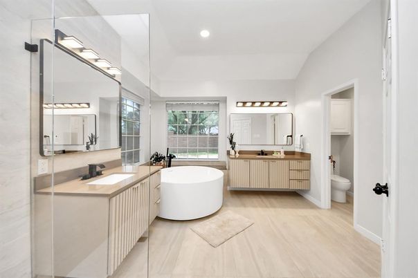 Bathroom, Dual Sink Vanities, Free Standing Baths, Glass Shower, Interior, Recessed Lighting, Wood Texture Flooring