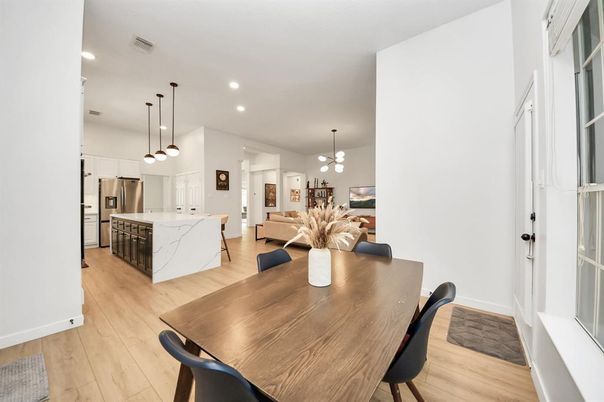 Dining room, Interior, Kitchen, Living room, Pendant Lights, Recessed Lighting, Stainless Steel Appliances, Wood Texture Flooring