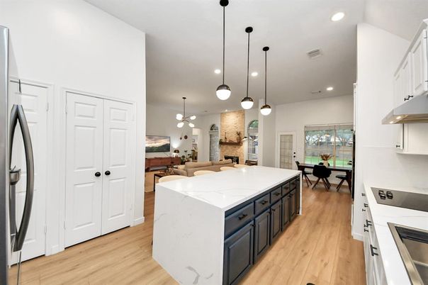 Dining room, Fireplace, Interior, Kitchen, Pendant Lights, Recessed Lighting, Wood Texture Flooring