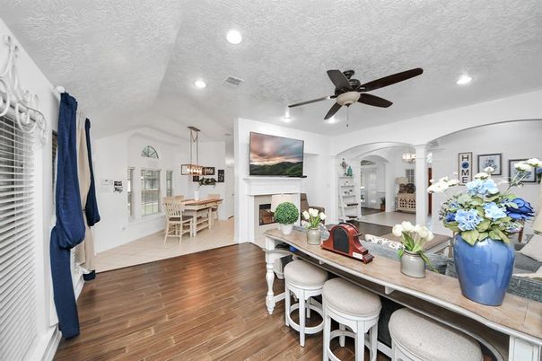 Dining room, Fireplace, Interior, Pendant Lights, Recessed Lighting, Wood Texture Flooring