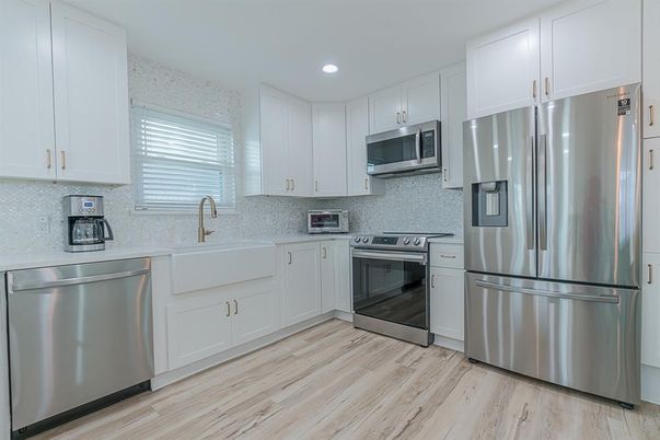 Interior, Kitchen, Recessed Lighting, Stainless Steel Appliances, Wood Texture Flooring