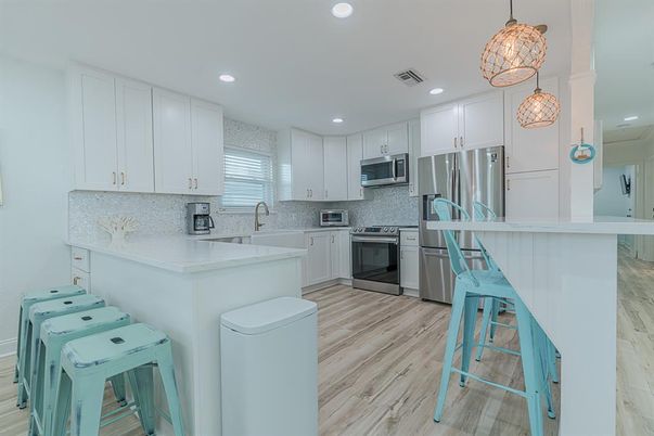 Interior, Kitchen, Pendant Lights, Recessed Lighting, Stainless Steel Appliances, Wood Texture Flooring