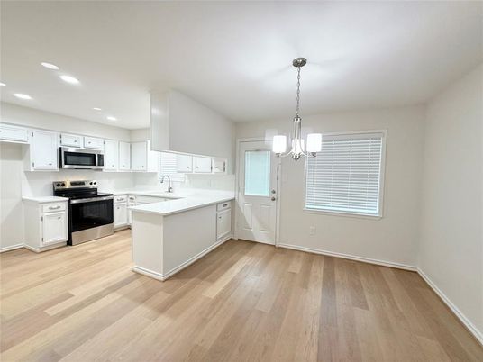 Interior, Kitchen, Pendant Lights, Recessed Lighting, Stainless Steel Appliances, Wood Texture Flooring