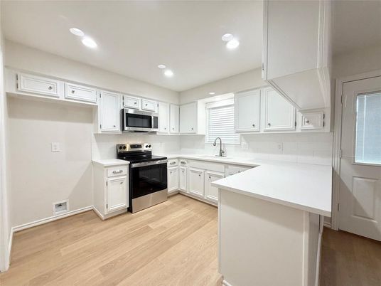 Interior, Kitchen, Recessed Lighting, Stainless Steel Appliances, Wood Texture Flooring