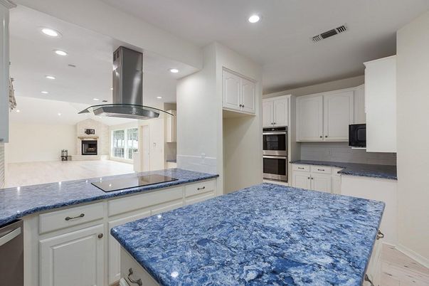 Fireplace, Interior, Kitchen, Recessed Lighting, Stainless Steel Appliances, Wood Texture Flooring