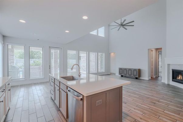 Fireplace, Interior, Kitchen, Recessed Lighting, Wood Texture Flooring