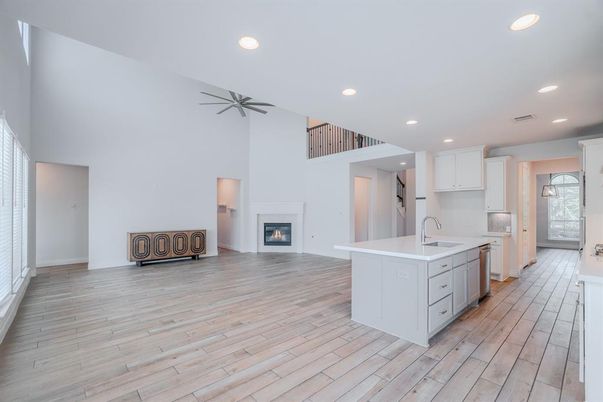 Fireplace, Interior, Kitchen, Recessed Lighting, Wood Texture Flooring