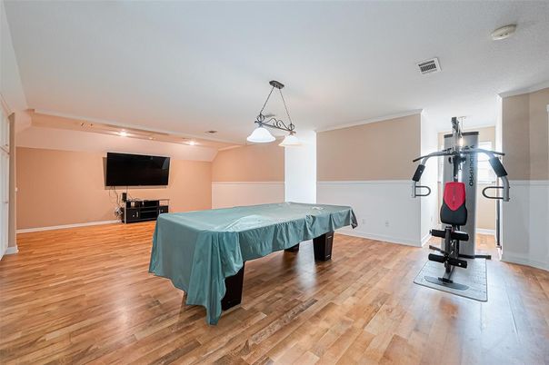 Billiard Table, Fitness Equipment, Game Room, Interior, Pendant Lights, Recessed Lighting, Wood Texture Flooring