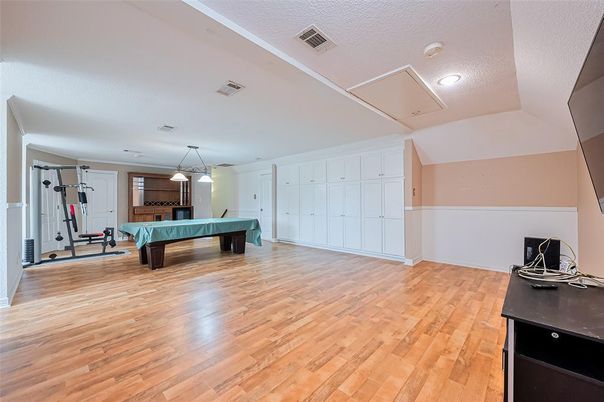 Billiard Table, Fitness Equipment, Game Room, Interior, Pendant Lights, Wood Texture Flooring