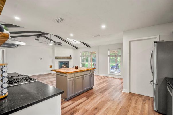 Fireplace, Interior, Kitchen, Recessed Lighting, Wood Texture Flooring