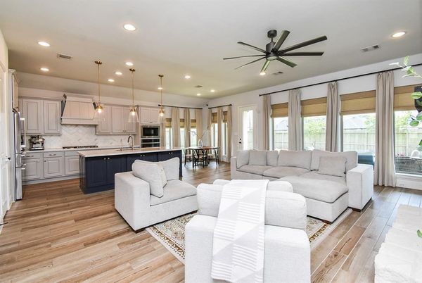 Dining room, Interior, Kitchen, Living room, Pendant Lights, Recessed Lighting, Stainless Steel Appliances, Wood Texture Flooring