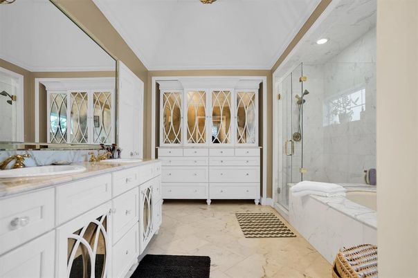 Bathroom, Dual Sink Vanities, Glass Shower, Interior, Marble, Marble Walls, Recessed Lighting