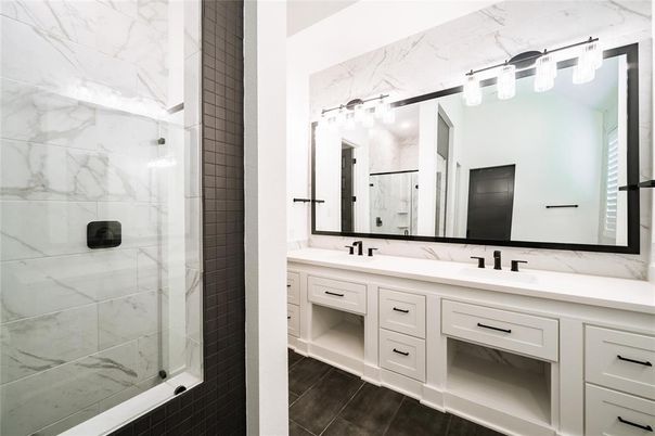 Bathroom, Dual Sink Vanities, Glass Shower, Interior, Marble Walls, Wood Texture Flooring