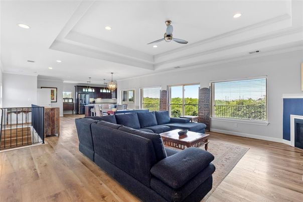 Chandelier, Interior, Kitchen, Living room, Pendant Lights, Recessed Lighting, Stainless Steel Appliances, Wood Texture Flooring