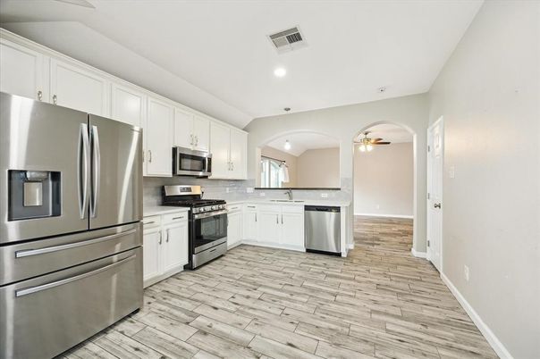 Interior, Kitchen, Recessed Lighting, Stainless Steel Appliances, Wood Texture Flooring
