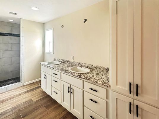 Bathroom, Dual Sink Vanities, Interior, Recessed Lighting, Wood Texture Flooring