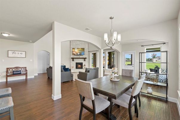 Dining room, Fireplace, Interior, Living room, Pendant Lights, Wood Texture Flooring