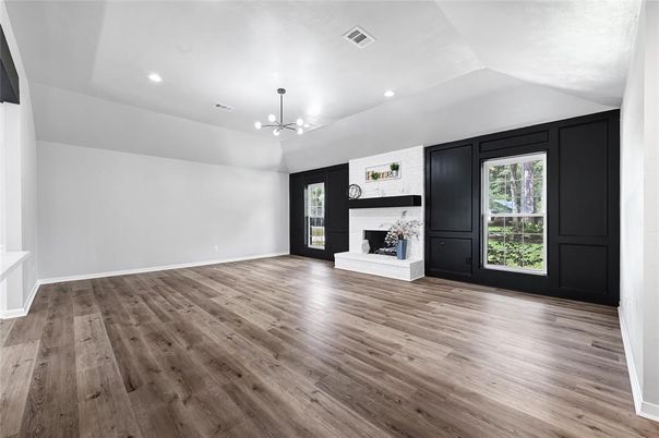 Empty room, Fireplace, Interior, Pendant Lights, Recessed Lighting, Wood Texture Flooring