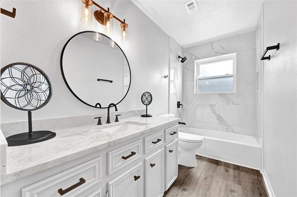 Bathroom, Dual Sink Vanities, Interior, Marble Walls, Wood Texture Flooring