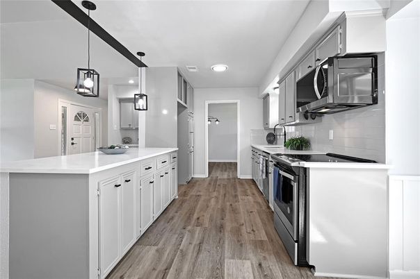 Interior, Kitchen, Pendant Lights, Recessed Lighting, Stainless Steel Appliances, Wood Texture Flooring