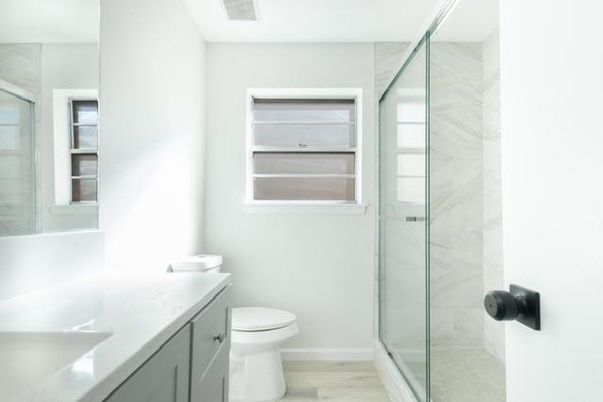 Bathroom, Glass Shower, Interior, Marble Walls, Wood Texture Flooring