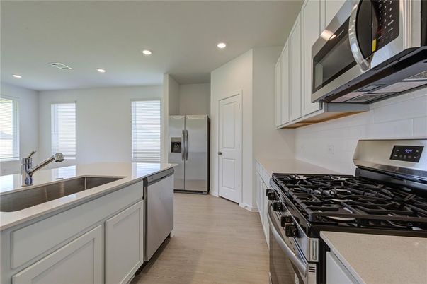 Interior, Kitchen, Recessed Lighting, Stainless Steel Appliances, Wood Texture Flooring