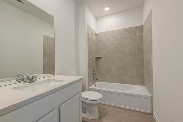 Bathroom, Dual Sink Vanities, Interior, Recessed Lighting, Wood Texture Flooring
