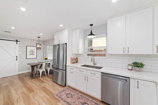 Dining room, Interior, Kitchen, Pendant Lights, Recessed Lighting, Stainless Steel Appliances, Wood Texture Flooring