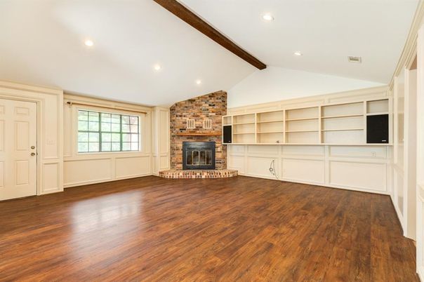 Empty room, Fireplace, Interior, Recessed Lighting, Stone Walls, Wooden Beams, Wood Texture Flooring