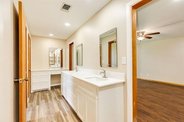Bathroom, Dual Sink Vanities, Interior, Recessed Lighting, Wood Texture Flooring