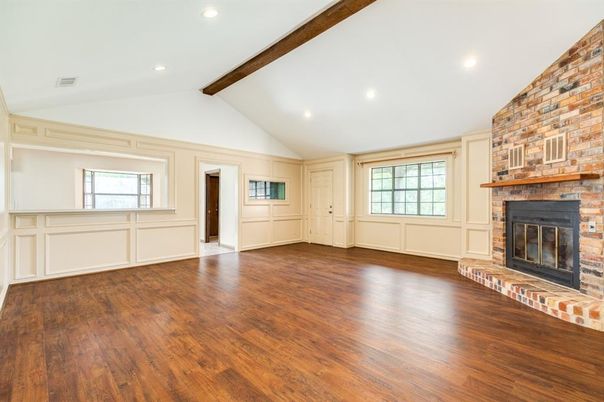 Empty room, Fireplace, Interior, Recessed Lighting, Stone Walls, Wooden Beams, Wood Texture Flooring