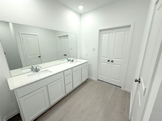 Bathroom, Dual Sink Vanities, Interior, Recessed Lighting, Wood Texture Flooring