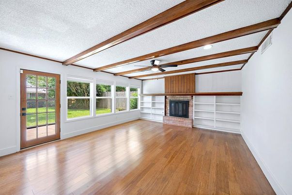 Empty room, Fireplace, Interior, Recessed Lighting, Wooden Beams, Wood Texture Flooring